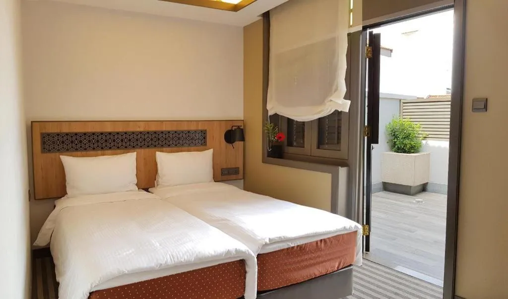 Bed in Aqueen Heritage Hotel Little India