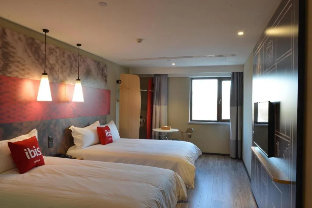 Bed in Ibis Harbin Normal University