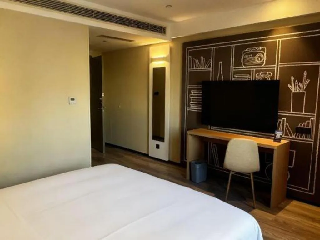Bed in Ibis Harbin Normal University