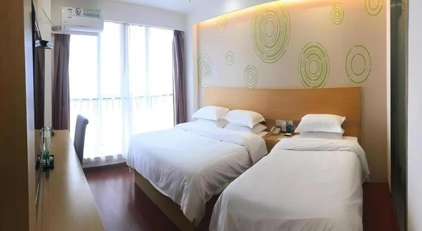 Bed in GreenTree Inn Yancheng Jiefang Road Express Hotel