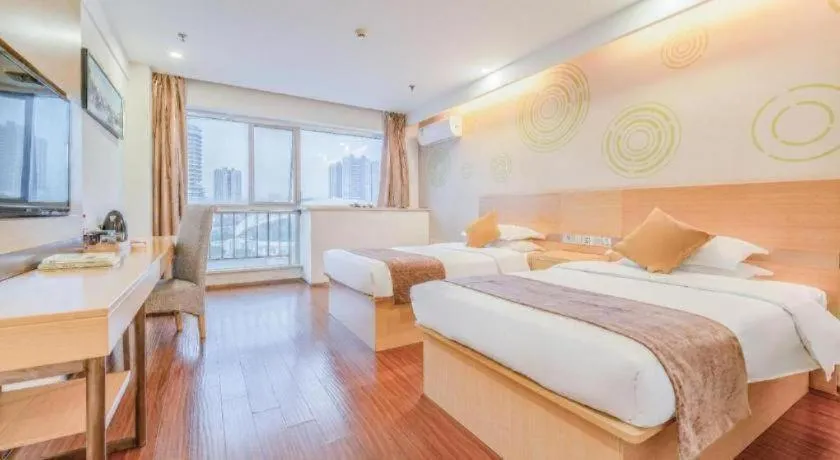 Bed in GreenTree Inn Yancheng Jiefang Road Express Hotel