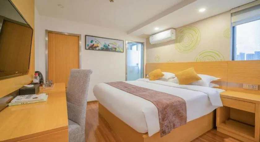 Bed in GreenTree Inn Yancheng Jiefang Road Express Hotel