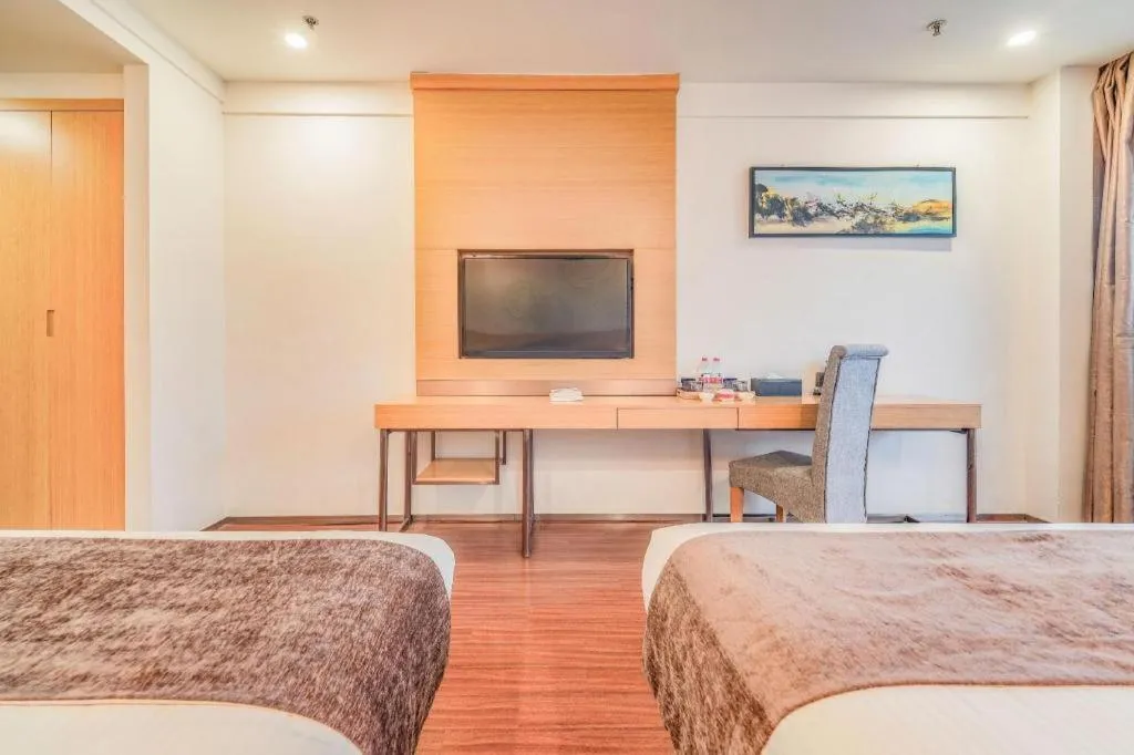 Bed in GreenTree Inn Yancheng Jiefang Road Express Hotel