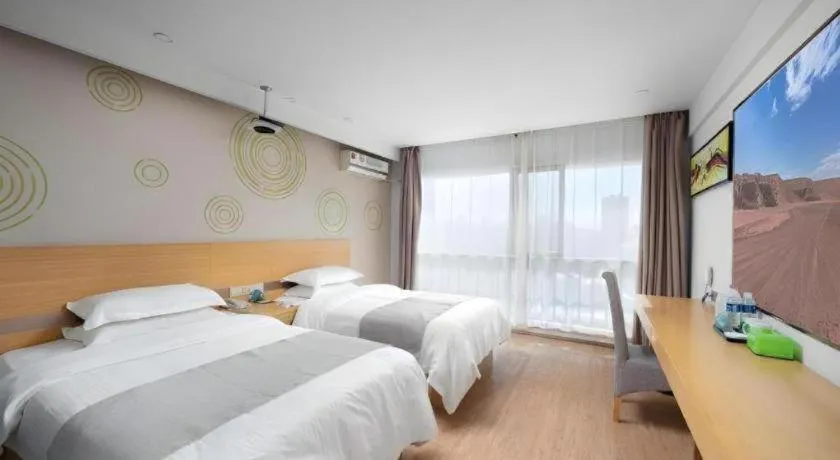 Bed in GreenTree Inn Yancheng Jiefang Road Express Hotel