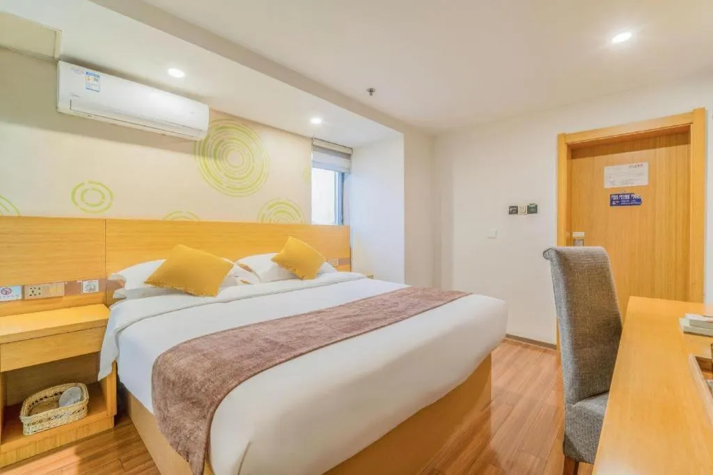 Bed in GreenTree Inn Yancheng Jiefang Road Express Hotel