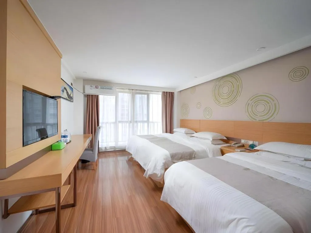 Bed in GreenTree Inn Yancheng Jiefang Road Express Hotel