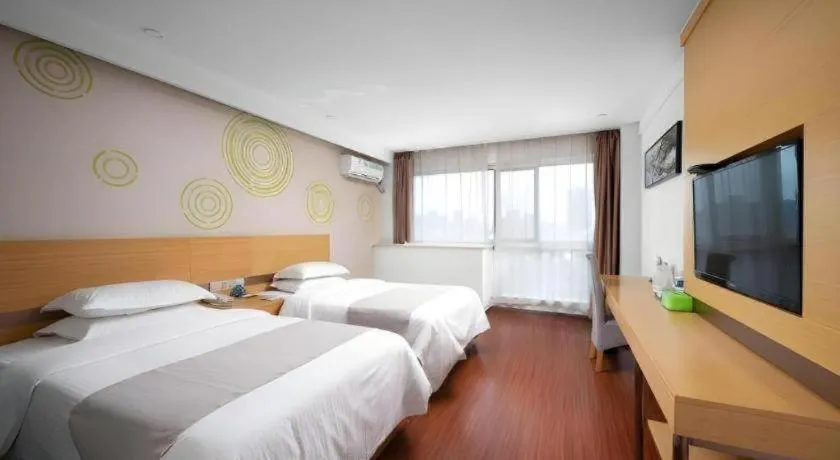 Bed in GreenTree Inn Yancheng Jiefang Road Express Hotel