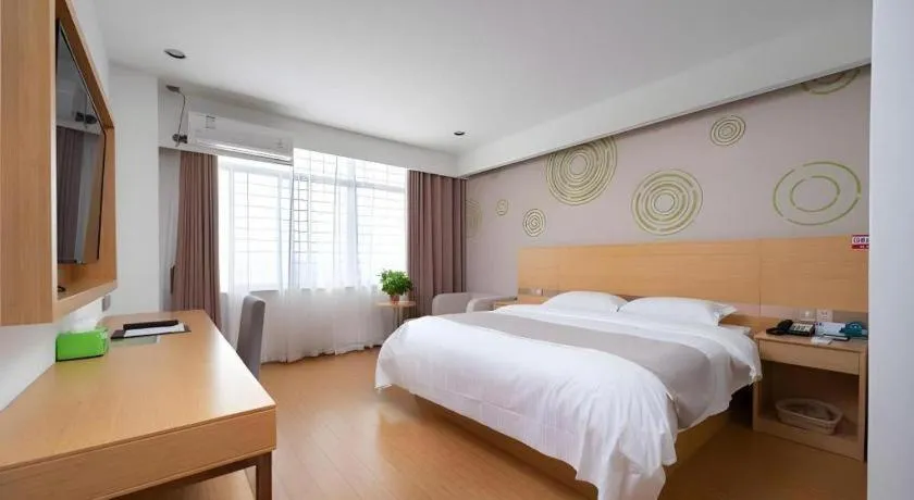 Bed in GreenTree Inn Yancheng Jiefang Road Express Hotel