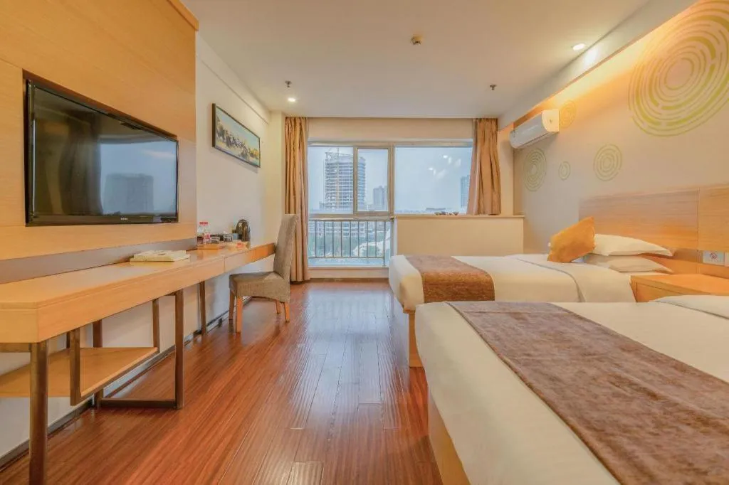 Bed in GreenTree Inn Yancheng Jiefang Road Express Hotel