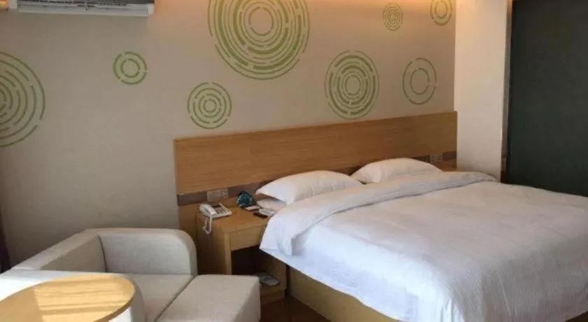 Bed in GreenTree Inn Yancheng Jiefang Road Express Hotel