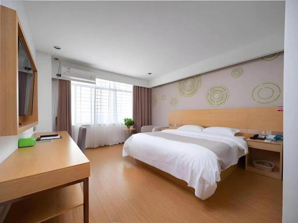 Bed in GreenTree Inn Yancheng Jiefang Road Express Hotel