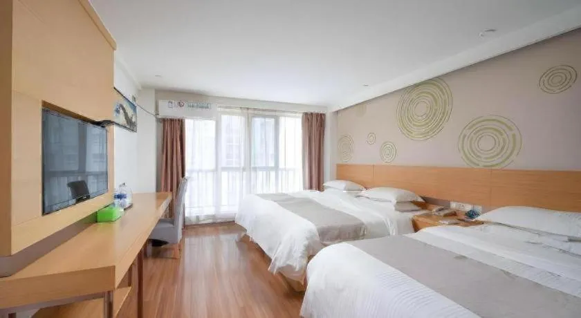 Bed in GreenTree Inn Yancheng Jiefang Road Express Hotel