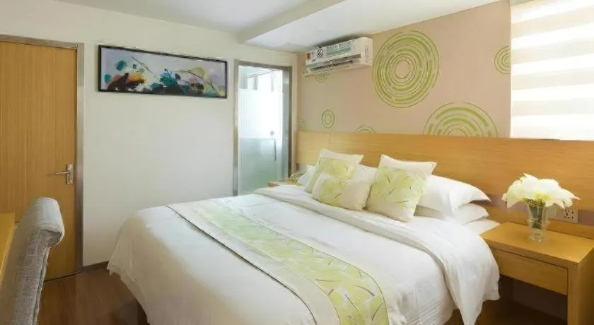 Bed in GreenTree Inn Yancheng Jiefang Road Express Hotel