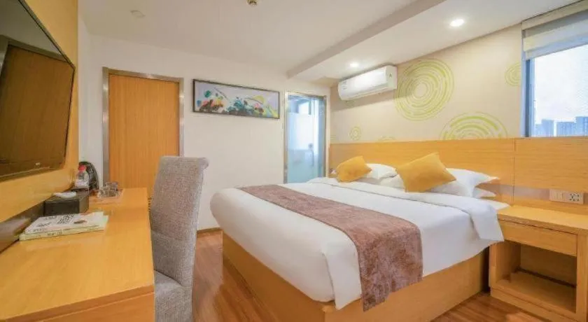 Bed in GreenTree Inn Yancheng Jiefang Road Express Hotel