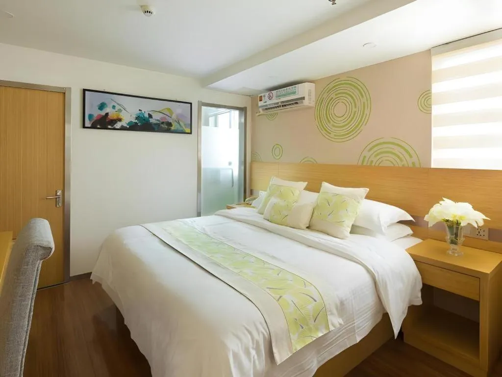 Bed in GreenTree Inn Yancheng Jiefang Road Express Hotel