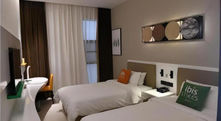Bed in ibis Styles Kunming Nanping Hotel