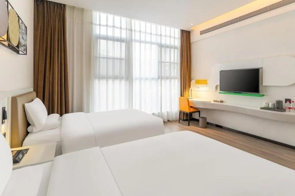 Bed in ibis Styles Kunming Nanping Hotel