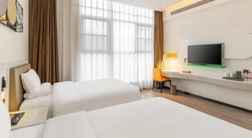 Bed in ibis Styles Kunming Nanping Hotel