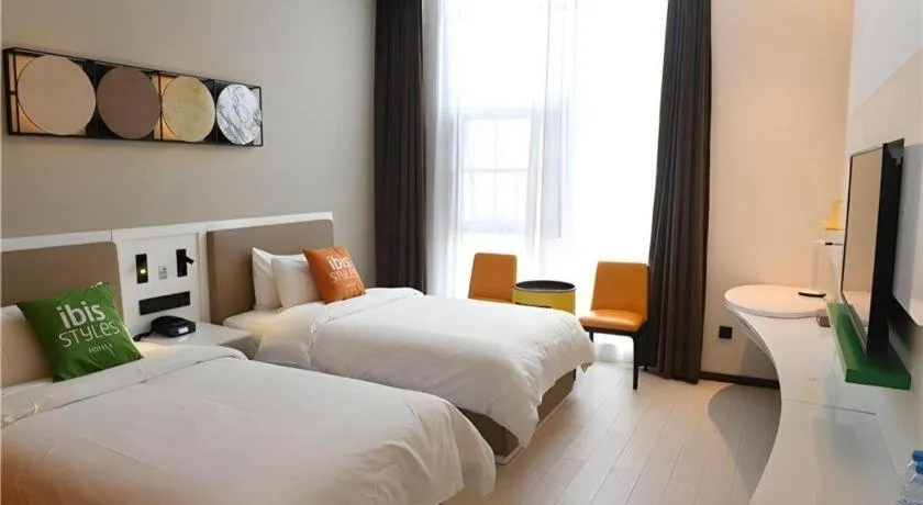 Bed in ibis Styles Kunming Nanping Hotel