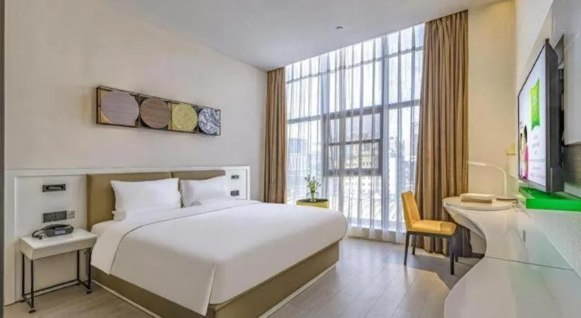 Bed in ibis Styles Kunming Nanping Hotel