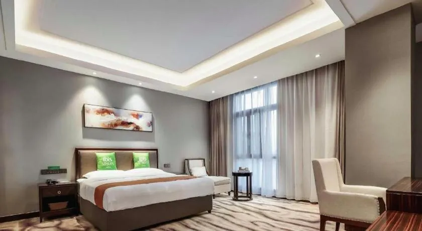 Bed in ibis Styles Nanjing Qilin Gate Hotel
