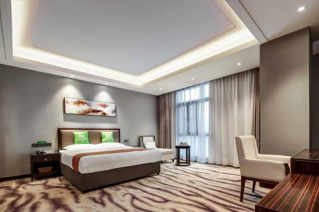 Bed in ibis Styles Nanjing Qilin Gate Hotel