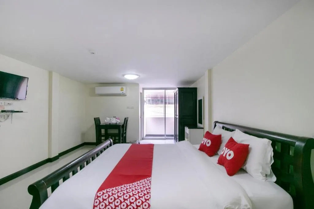Bed in OYO 75390 Sunee Place Hotel