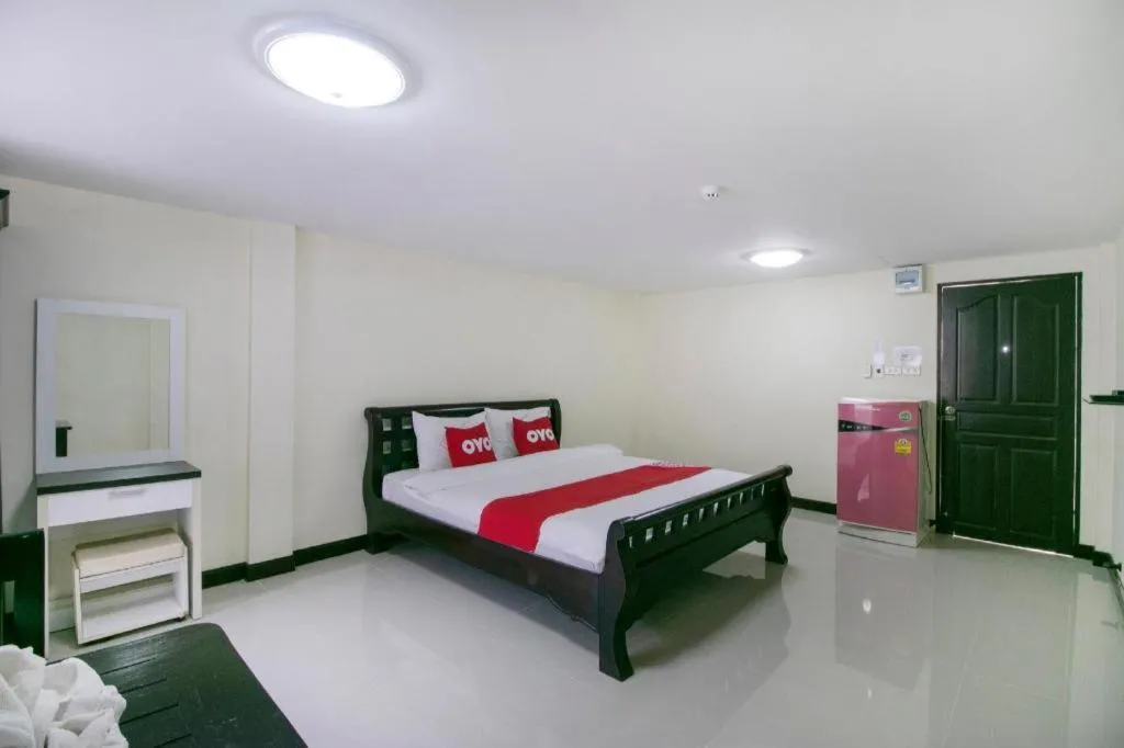 Bed in OYO 75390 Sunee Place Hotel