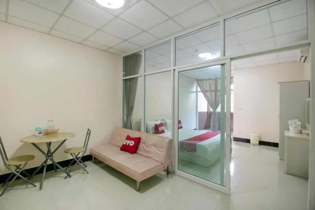 Bed in OYO 75390 Sunee Place Hotel