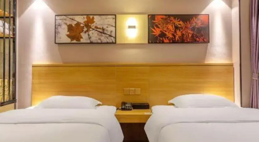 Bed in GreenTree Alliance Hotel Kunming Chuanjin Road Branch Bed in GreenTree Alliance Hotel Kunming Chuanjin Road Branch