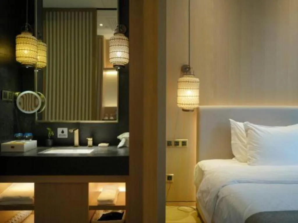 Bed in Jolie Vue Boutique Hotel Sanjiang