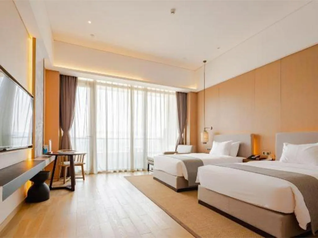 Bed in Jolie Vue Boutique Hotel Sanjiang