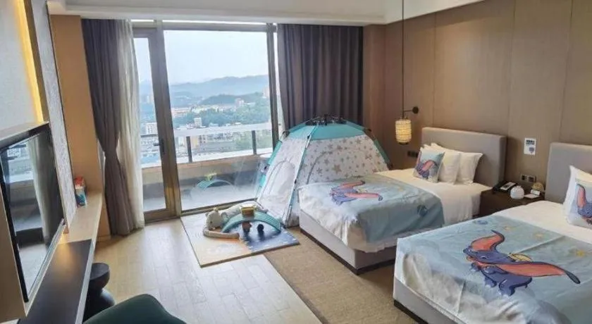 Bed in Jolie Vue Boutique Hotel Sanjiang