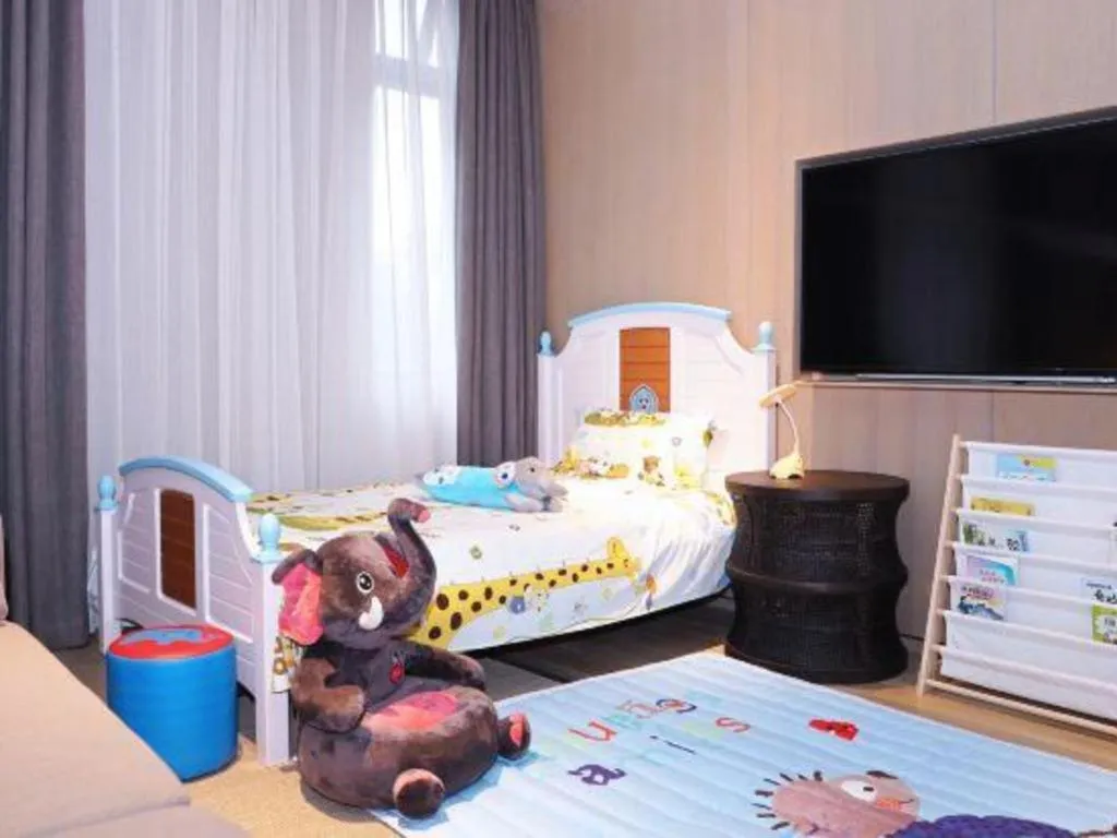 Bed in Jolie Vue Boutique Hotel Sanjiang