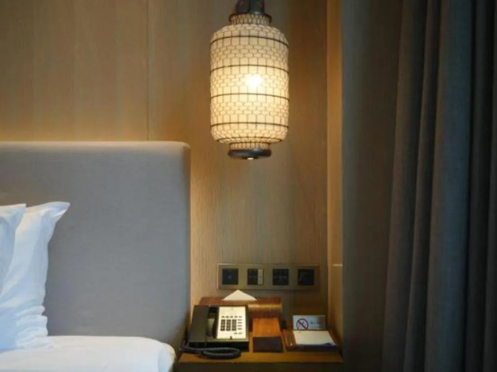 Bed in Jolie Vue Boutique Hotel Sanjiang