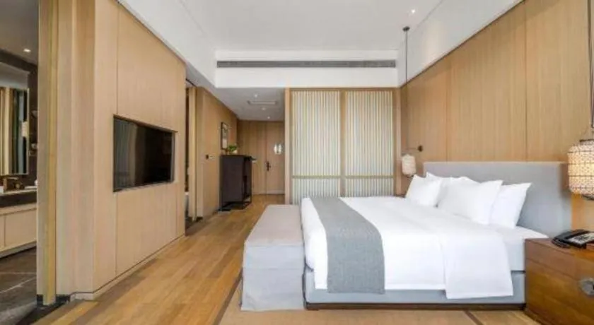 Bed in Jolie Vue Boutique Hotel Sanjiang