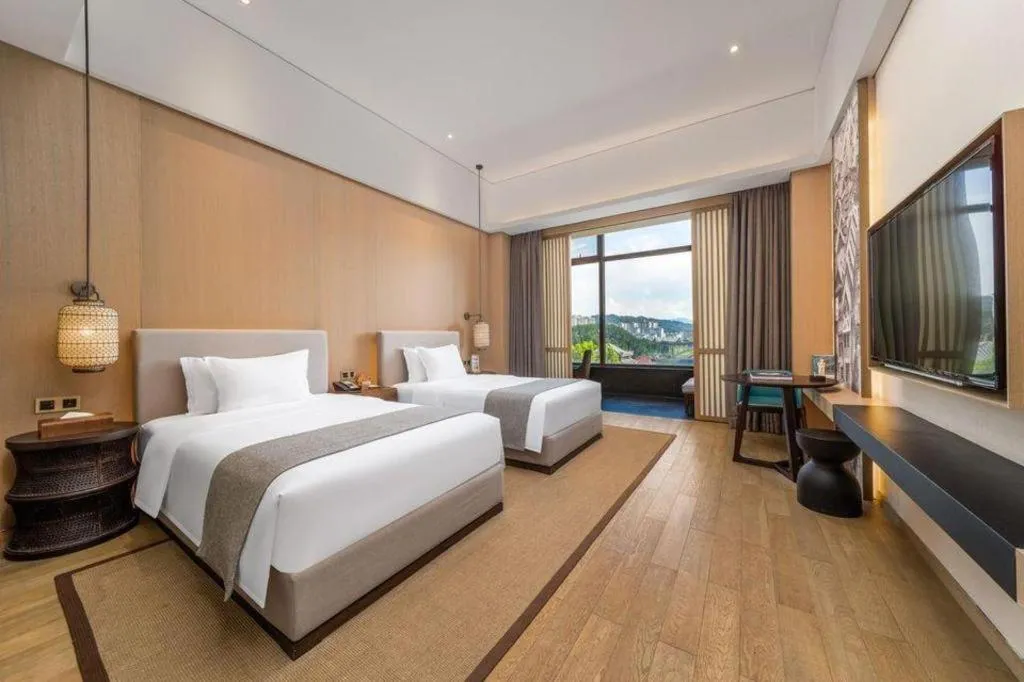 Bed in Jolie Vue Boutique Hotel Sanjiang