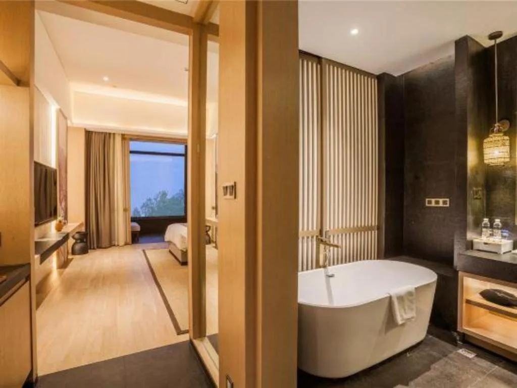 Bed in Jolie Vue Boutique Hotel Sanjiang