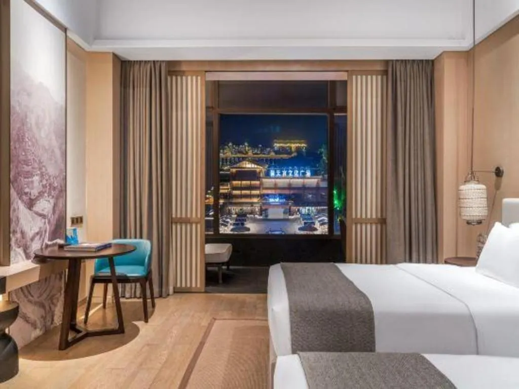 Bed in Jolie Vue Boutique Hotel Sanjiang