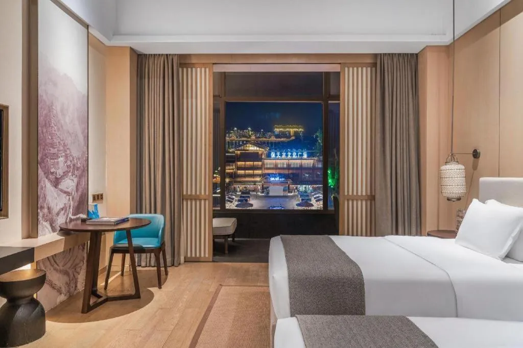 Bed in Jolie Vue Boutique Hotel Sanjiang