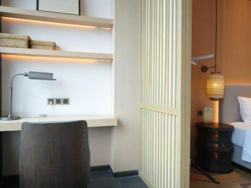 Bed in Jolie Vue Boutique Hotel Sanjiang