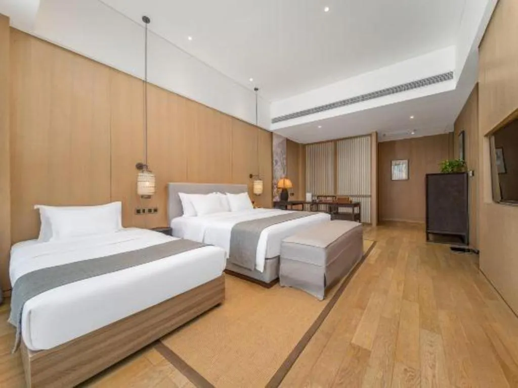 Bed in Jolie Vue Boutique Hotel Sanjiang