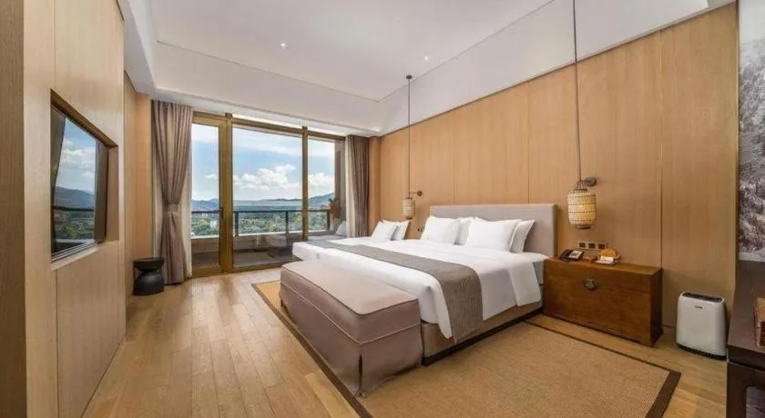 Bed in Jolie Vue Boutique Hotel Sanjiang