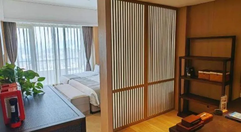 Bed in Jolie Vue Boutique Hotel Sanjiang