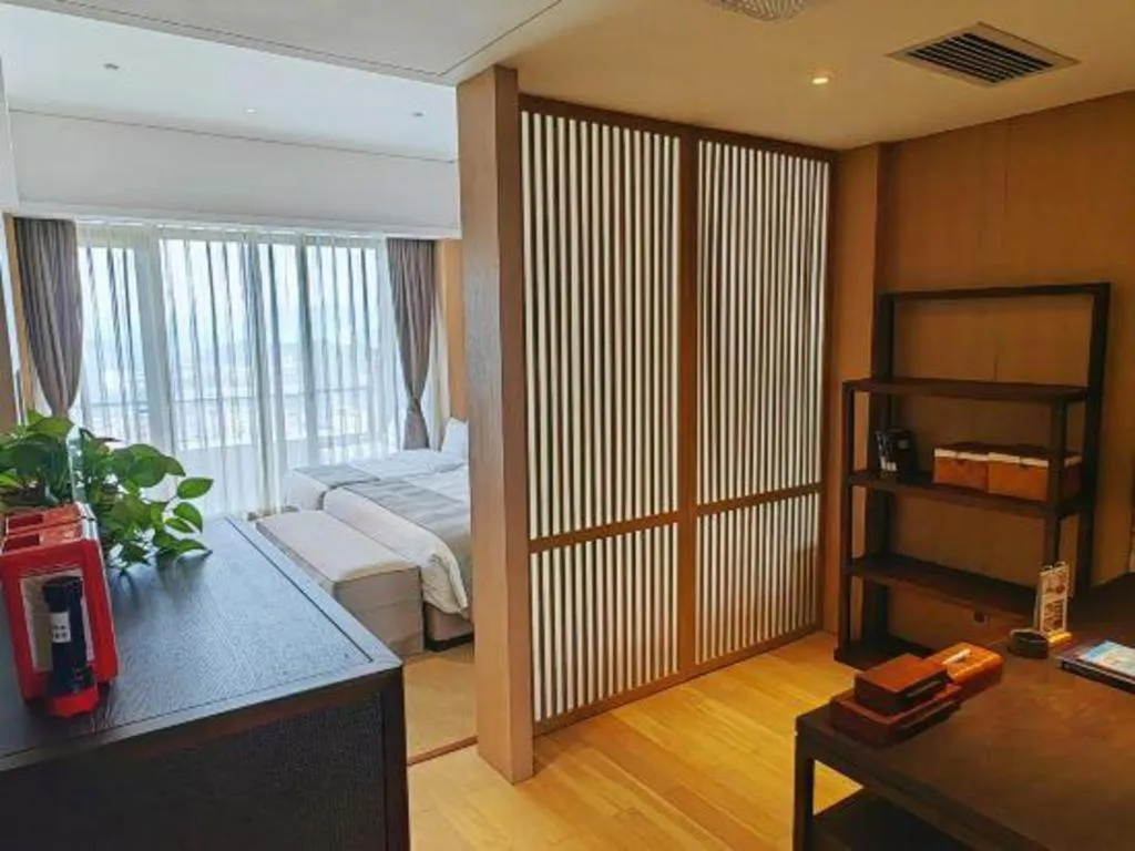 Bed in Jolie Vue Boutique Hotel Sanjiang
