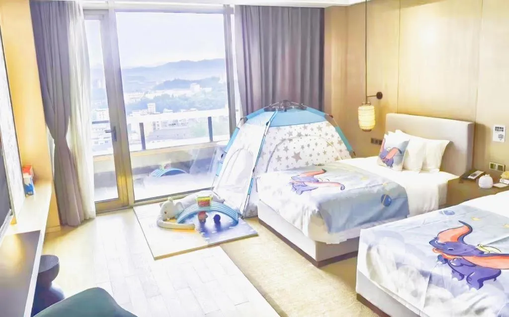 Bed in Jolie Vue Boutique Hotel Sanjiang