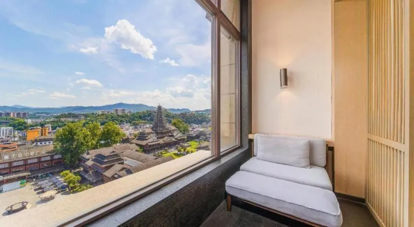 Bed in Jolie Vue Boutique Hotel Sanjiang