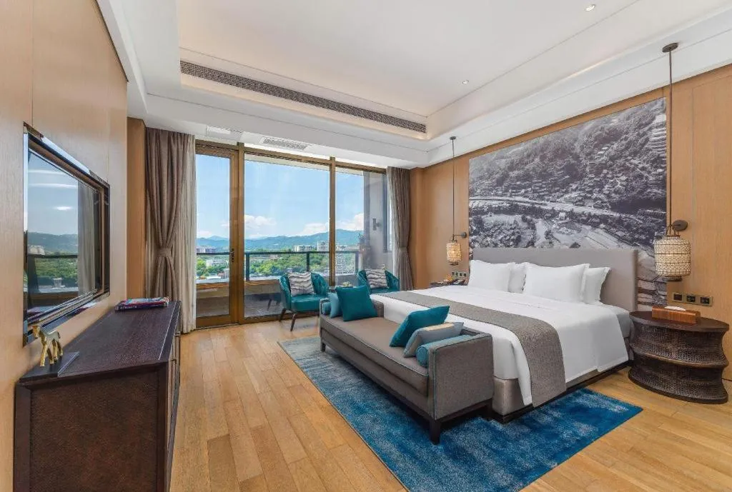 Bed in Jolie Vue Boutique Hotel Sanjiang