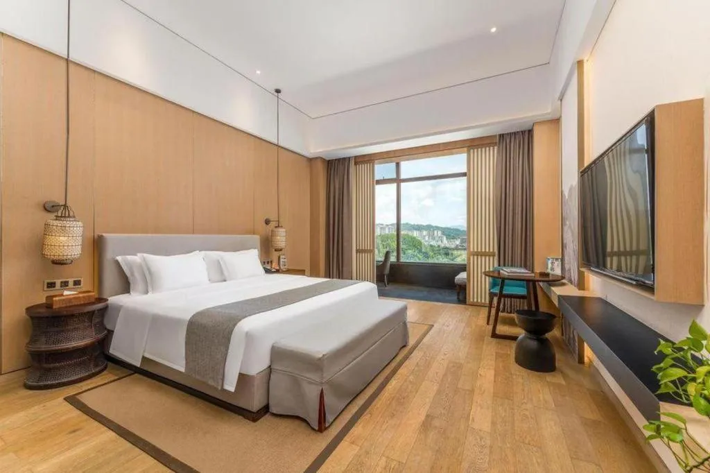 Bed in Jolie Vue Boutique Hotel Sanjiang