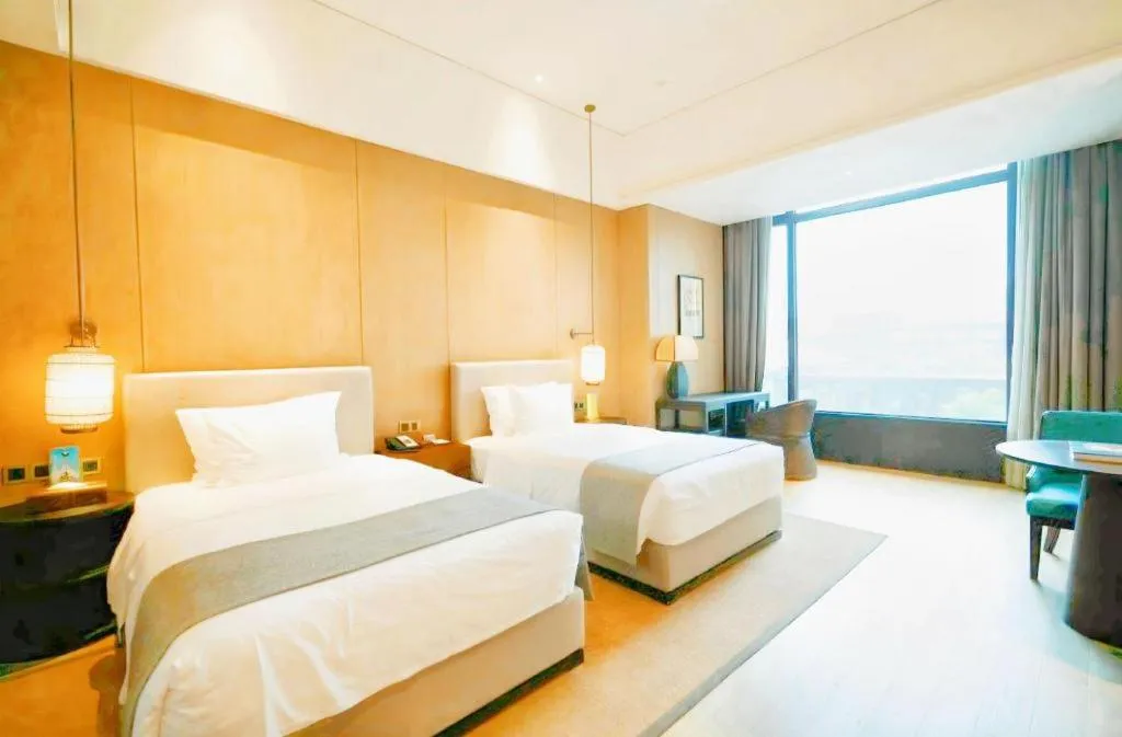 Bed in Jolie Vue Boutique Hotel Sanjiang
